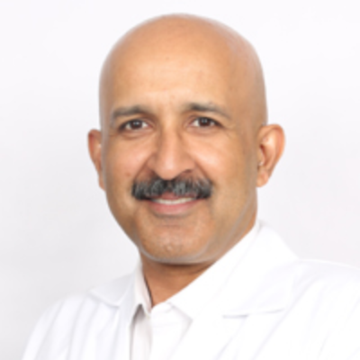 Dr. Havind Tandon