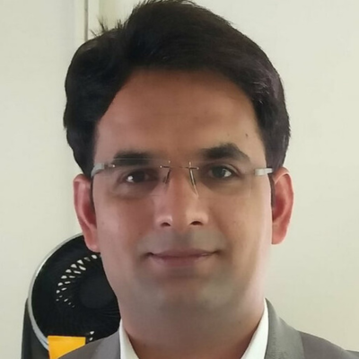 Dr. Dharmender Malik