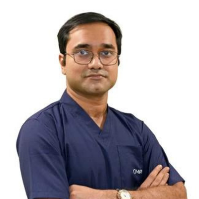Dr. Manish De