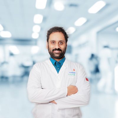 Dr. Nikhil B